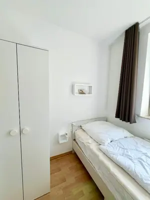 Ein Bett oder Betten in einem Zimmer der Unterkunft Lord Nelson 110
