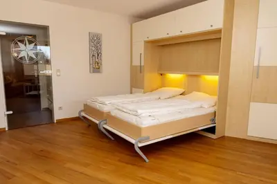 Ein Bett oder Betten in einem Zimmer der Unterkunft Lord Nelson 115