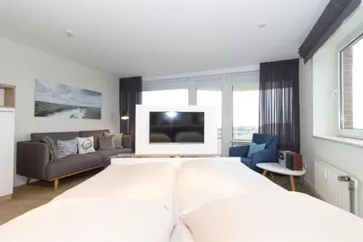 Ein Bett oder Betten in einem Zimmer der Unterkunft Lord Nelson 401