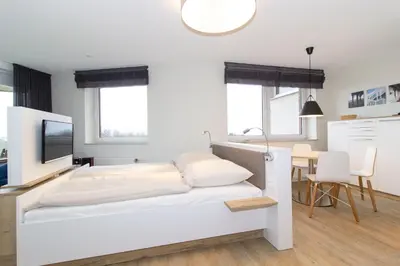 Ein Bett oder Betten in einem Zimmer der Unterkunft Lord Nelson 401