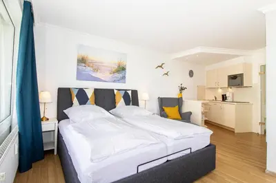 Ein Bett oder Betten in einem Zimmer der Unterkunft Lord Nelson 320