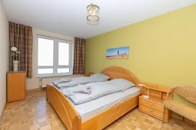 Ein Bett oder Betten in einem Zimmer der Unterkunft Seeterrassen 35