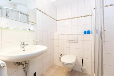 Ein Badezimmer in der Unterkunft Kurpark-Residenz 143