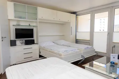 Ein Bett oder Betten in einem Zimmer der Unterkunft Lord Nelson 111