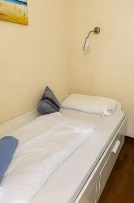 Ein Bett oder Betten in einem Zimmer der Unterkunft Lord Nelson 111