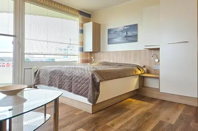 Ein Bett oder Betten in einem Zimmer der Unterkunft Lord Nelson 520