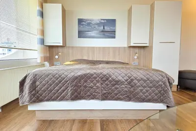Ein Bett oder Betten in einem Zimmer der Unterkunft Lord Nelson 520