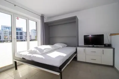 Ein Bett oder Betten in einem Zimmer der Unterkunft Marina 46