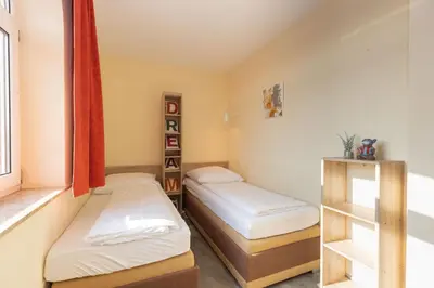 Ein Bett oder Betten in einem Zimmer der Unterkunft Trafalgar 227