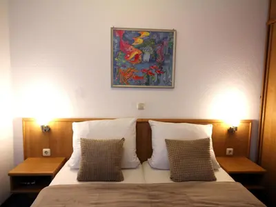 Ein Bett oder Betten in einem Zimmer der Unterkunft Residenz Albatros Cuxhaven 2