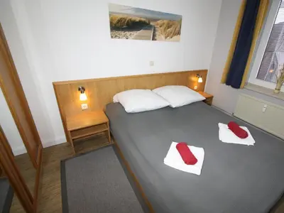 Ein Bett oder Betten in einem Zimmer der Unterkunft Residenz Albatros Cuxhaven 3