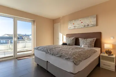 Ein Bett oder Betten in einem Zimmer der Unterkunft Deichoase