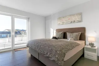 Ein Bett oder Betten in einem Zimmer der Unterkunft Deichoase