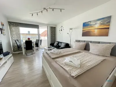 Ein Bett oder Betten in einem Zimmer der Unterkunft Haus Nautic Döse Wohnung 301