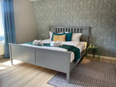 Ein Bett oder Betten in einem Zimmer der Unterkunft Nige Ooge 6
