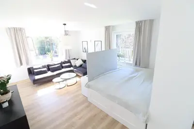 Ein Bett oder Betten in einem Zimmer der Unterkunft Meerhaus EG
