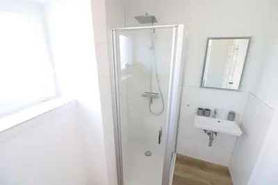 Ein Badezimmer in der Unterkunft Meerhaus EG