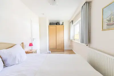 Ein Bett oder Betten in einem Zimmer der Unterkunft 