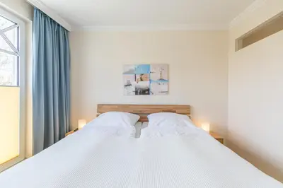 Ein Bett oder Betten in einem Zimmer der Unterkunft 