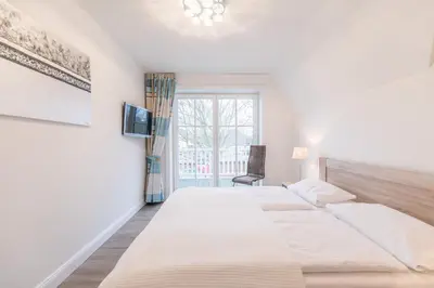 Ein Bett oder Betten in einem Zimmer der Unterkunft 