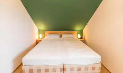 Ein Bett oder Betten in einem Zimmer der Unterkunft 