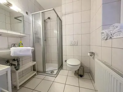 Ein Badezimmer in der Unterkunft Apartmenthaus Waldbad WHG Westwind 15 4