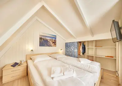 Ein Bett oder Betten in einem Zimmer der Unterkunft Am Ringwall 91 - Seelöwe A