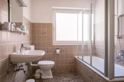 Ein Badezimmer in der Unterkunft 