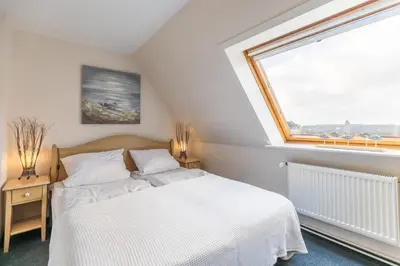 Ein Bett oder Betten in einem Zimmer der Unterkunft 
