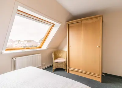 Ein Bett oder Betten in einem Zimmer der Unterkunft 