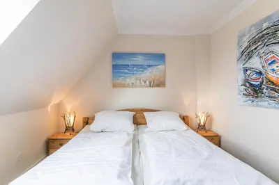Ein Bett oder Betten in einem Zimmer der Unterkunft 