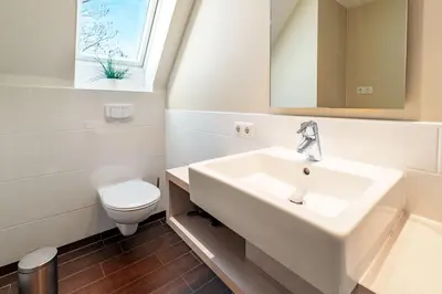 Ein Badezimmer in der Unterkunft 