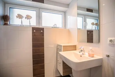 Ein Badezimmer in der Unterkunft 
