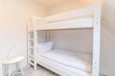 Ein Bett oder Betten in einem Zimmer der Unterkunft 