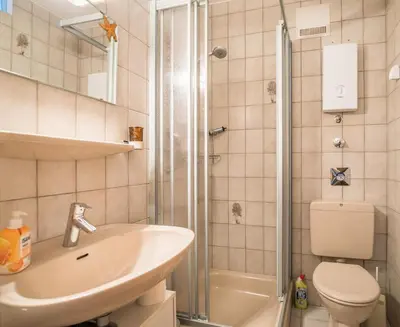 Ein Badezimmer in der Unterkunft 