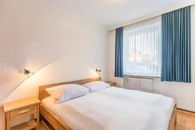 Ein Bett oder Betten in einem Zimmer der Unterkunft 