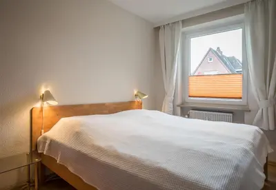 Ein Bett oder Betten in einem Zimmer der Unterkunft 