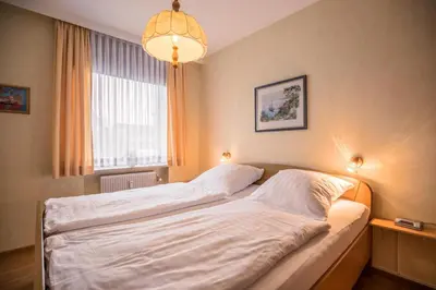 Ein Bett oder Betten in einem Zimmer der Unterkunft 