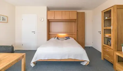 Ein Bett oder Betten in einem Zimmer der Unterkunft 