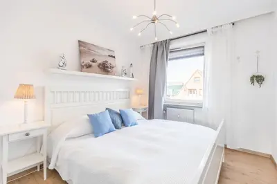 Ein Bett oder Betten in einem Zimmer der Unterkunft 