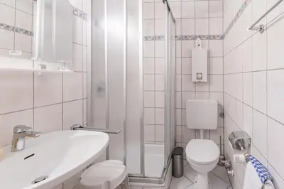 Ein Badezimmer in der Unterkunft 
