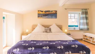 Ein Bett oder Betten in einem Zimmer der Unterkunft 
