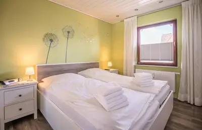Ein Bett oder Betten in einem Zimmer der Unterkunft 