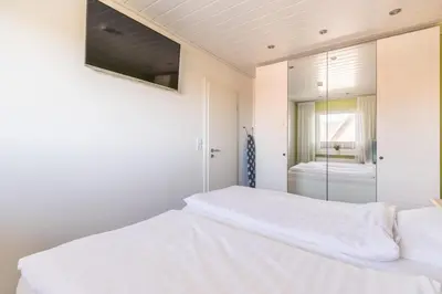 Ein Bett oder Betten in einem Zimmer der Unterkunft 