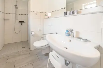 Ein Badezimmer in der Unterkunft 