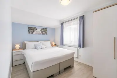 Ein Bett oder Betten in einem Zimmer der Unterkunft 