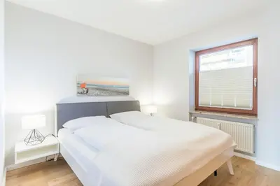 Ein Bett oder Betten in einem Zimmer der Unterkunft 