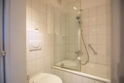 Ein Badezimmer in der Unterkunft 