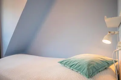 Ein Bett oder Betten in einem Zimmer der Unterkunft 
