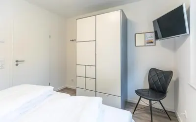Ein Bett oder Betten in einem Zimmer der Unterkunft Strandtraum Strandtraum